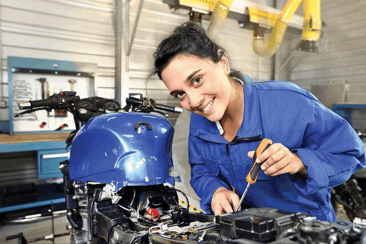 Apprentice mechanic at work